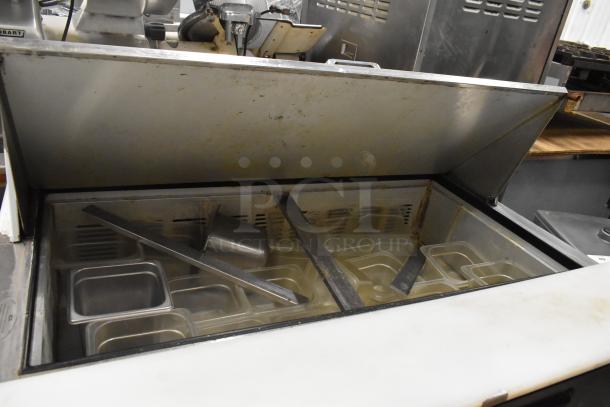 2017 Leader ESLM48S/C commercial sandwich salad prep table with bain marie top, on casters. Visible wear. 115V, 1 Phase.