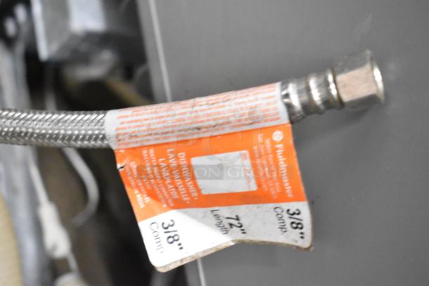 General Electric GE undercounter dishwasher, 115 Volts, 1 Phase. Tag indicates 72" length, 3/8" connection fitting.