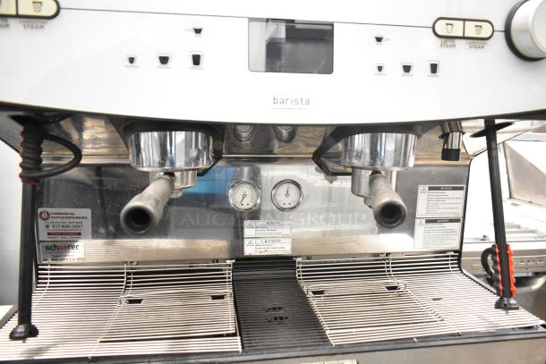 Schaerer Barista 2 Group Espresso Machine, includes 5 portafilters, steam wands, visible gauges, and caution labels.