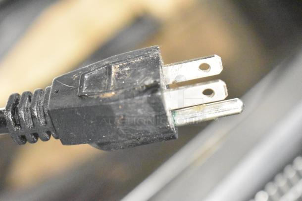 Close-up of a black power plug for the 2024 Avantco 194UCB77A Commercial Undercounter Ice Machine. 115 Volts, 1 Phase.