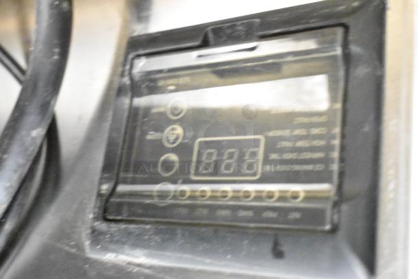 Close-up of control panel on a 2024 Avantco 194UCB77A commercial ice machine, model and settings visible.