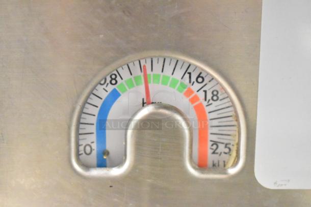 Gauge detail of La Cimbali M29 Select espresso machine, showing pressure levels from 0 to 2.5, with colored zones.