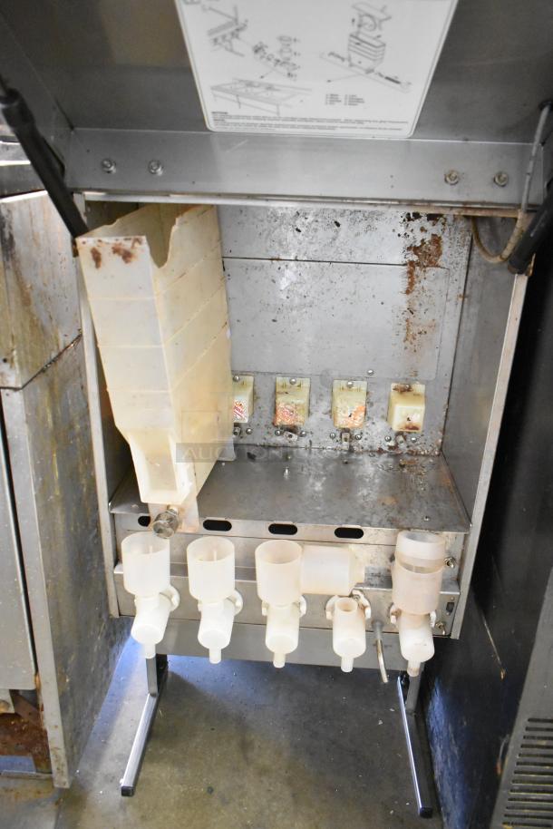 Bunn IMIX-5 commercial cappuccino machine, countertop model, used condition, five dispensing nozzles visible.