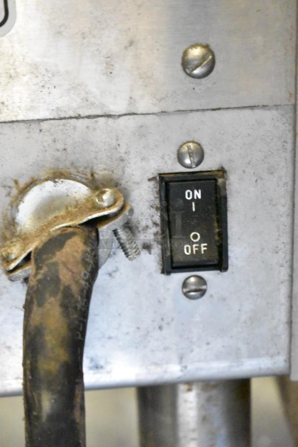 Bunn IMIX-5 Cappuccino Machine power switch and cord detail, showing slight wear; 120-208/240V, 1 Phase.