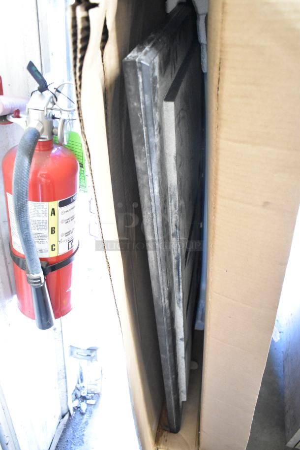 Two Samsung 50" Smart Signage LED displays in packaging, ready for auction. Condition: See image for specifics.