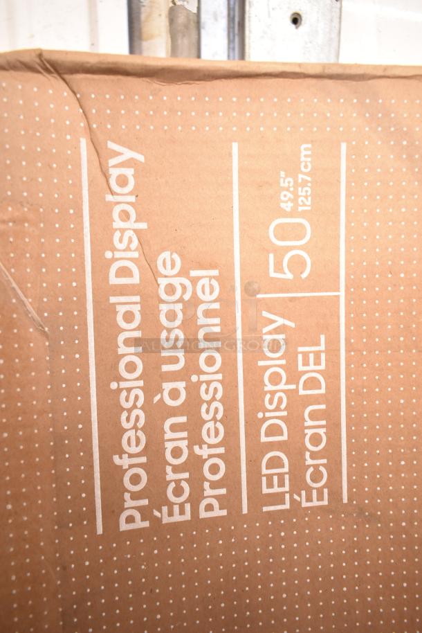 Samsung 50" Smart Signage LED Display box showing product information, mentions "Professional Display" and dimensions 49.5".