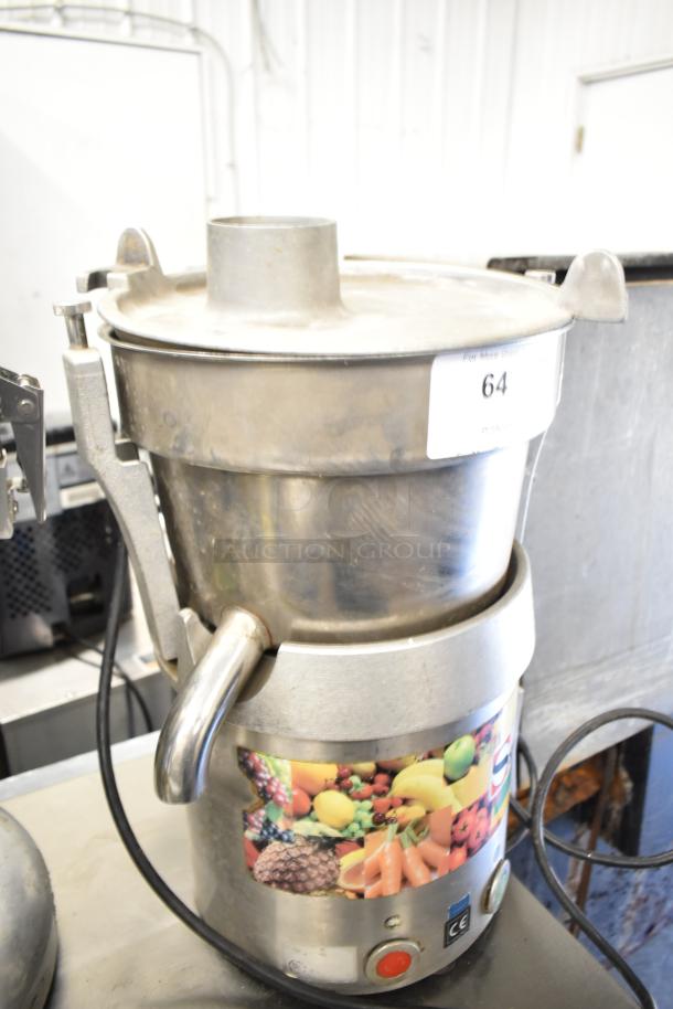 Santos Commercial Countertop Juicer, stainless steel, 115V, 1 Phase, sturdy build, vibrant fruit graphic, good condition.