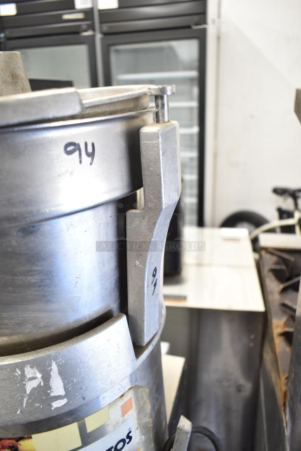 Santos Commercial Countertop Juicer, stainless steel, 115V, 1 Phase, visible wear, model number marked "94."