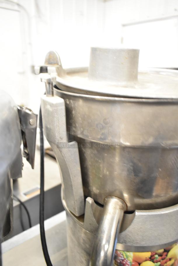 Santos Commercial Countertop Juicer, 115 Volts, 1 Phase, stainless steel, used condition, features a large feed chute.
