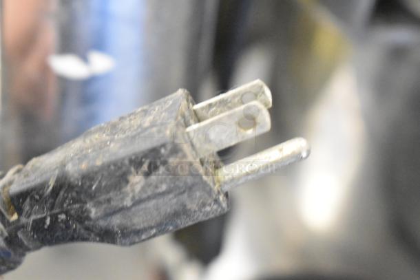 Dirty power plug for Santos Commercial Countertop Juicer, 115 volts, 1 phase, indicating signs of wear.