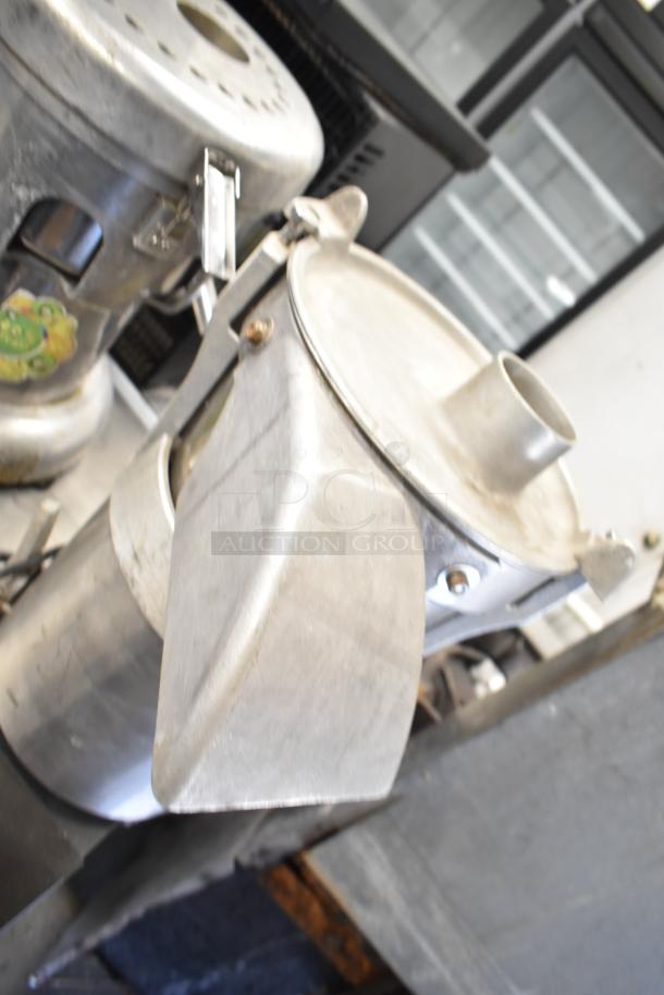 Santos Commercial Countertop Juicer, stainless steel, 115 volts, 1 phase, used condition, visible wear.