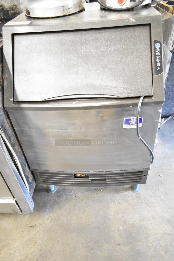 2018 Manitowoc UYF0140A ice maker with bin, half-dice cubes, 100-200 lbs/24hr, 115V, 1 phase, used condition.