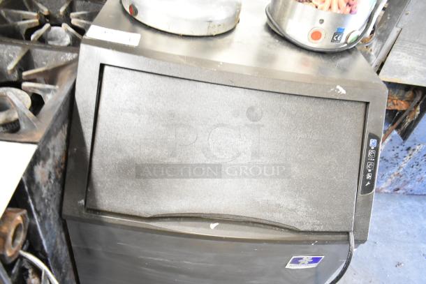 2018 Manitowoc UYF0140A Half-Dice Ice Maker with Bin, cube-style, 100-200 lbs/24 hr production, 115V, used condition.