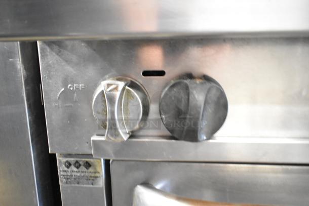 Southbend P32A-BBB 6 burner range control knobs with "OFF" label and stainless steel finish, indicating natural gas use.