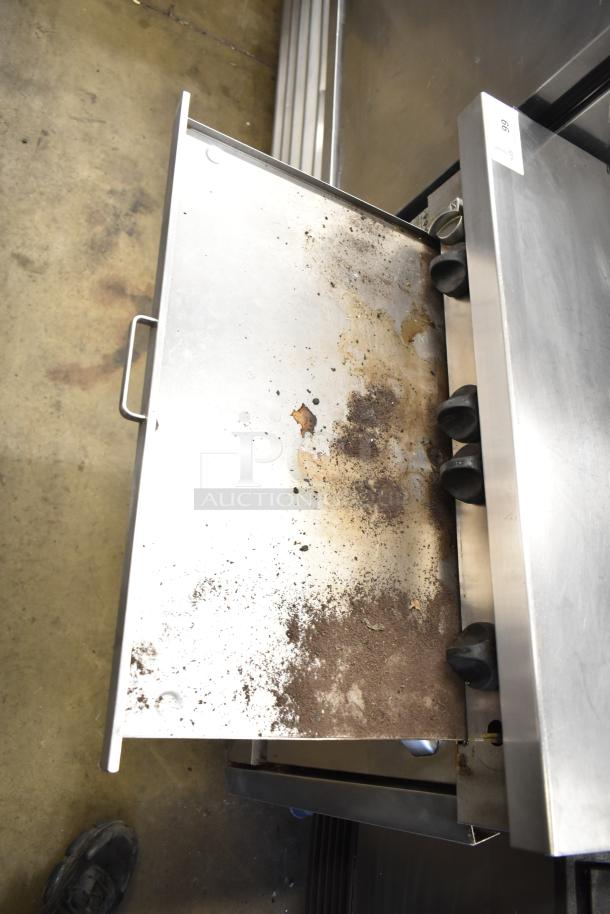 Southbend P32A-BBB commercial gas range, 6 burners, convection oven, salamander melter; features visible wear.