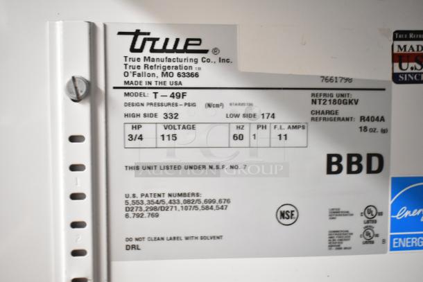True T-49F Commercial Freezer label indicating model T-49F, 115 volts, 1 phase, 3/4 HP, refrigerant R404A, NSF certified.