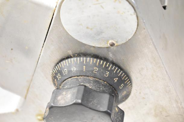 Globe 500 Commercial Countertop Meat Slicer dial close-up, showing numbered settings. Missing carriage. 115 Volts, 1 Phase.