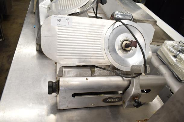 Globe 500 Commercial Meat Slicer with blade sharpener, missing carriage, 115 volts, 1 phase, used condition.