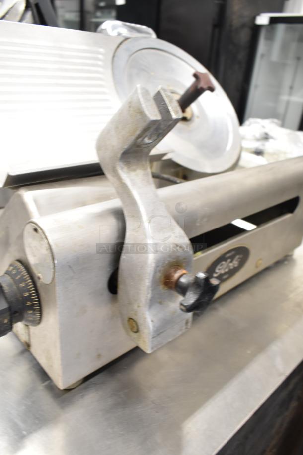 Globe 500 Commercial Countertop Meat Slicer, missing carriage, includes blade sharpener, 115 volts, 1 phase.