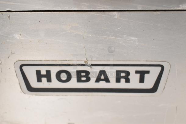 2019 Hobart Edge13A-11 meat slicer, includes blade sharpener, missing carriage and arm, 115V, 1 phase, used condition.