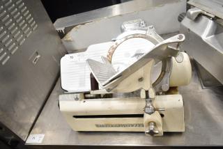 Globe 260 Commercial Countertop Meat Slicer with Blade Sharpener, 115 Volts, 1 Phase, visible wear, model label intact.