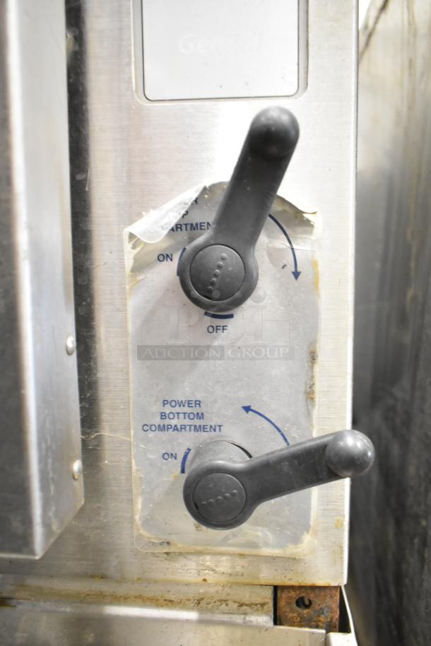 Cleveland Gemini 2 Deck Steam Cabinet controls; visible wear on dials and labels indicate compartment power settings.