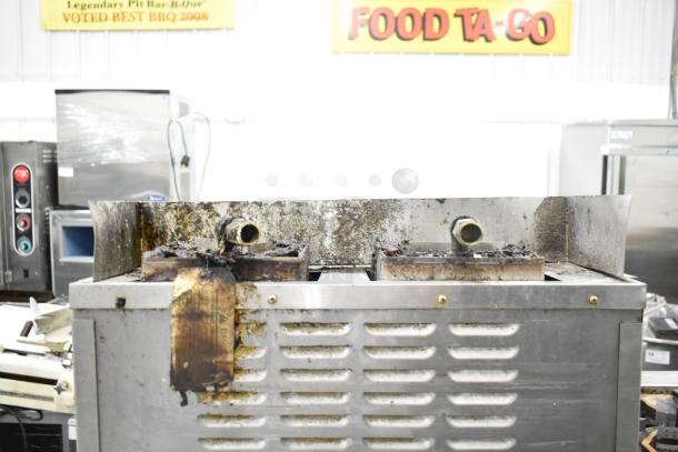 Cleveland Gemini 2 Deck Steam Cabinet, commercial use, visibly worn, showing signs of rust and residue buildup.