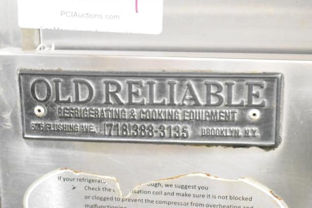 2017 Leader LM48S/C 2 Door Work Top Cooler, 115V, 1 Phase. Label reads "Old Reliable Refrigerating & Cooking Equipment".