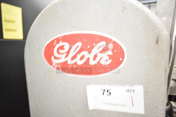 Globe 79 Commercial Countertop Meat Saw, 115V, 1 Phase. Worn Globe logo. Lot tag "#75 PCI Auctions" visible.