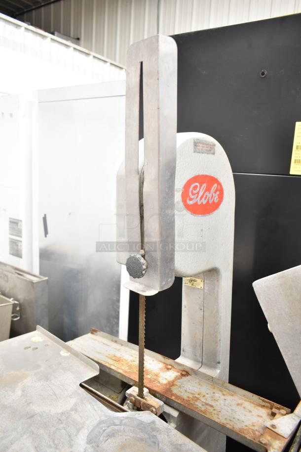 Globe 79 Commercial Countertop Meat Saw, 115 Volts, 1 Phase, used, visible rust on blade guide, brand label intact.