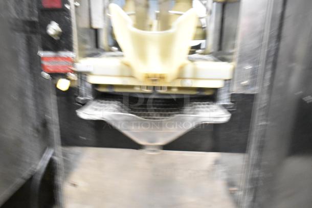 Automatic S-16 Commercial Citrus Juicer, 115V, 1 Phase, countertop model. Used condition. Key components visible.