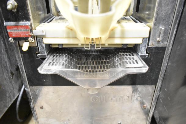 Automatic S-16 Commercial Countertop Citrus Juicer, stainless steel, 115V, used condition, marked "Automatic."