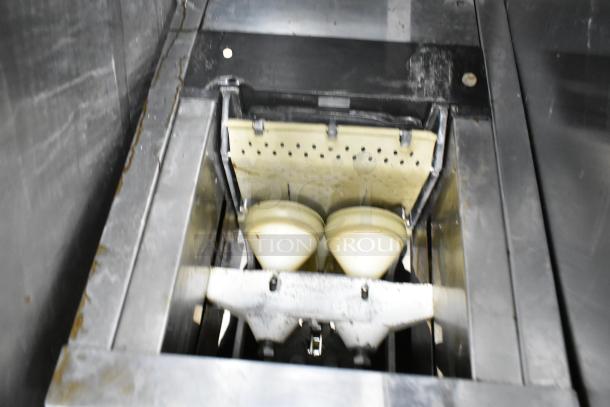 Automatic S-16 Commercial Countertop Citrus Juicer, stainless steel, dual cones, 115V, 1 phase, used condition.