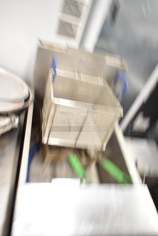 Frymaster GPCSC commercial gas fryer, 80,000 BTU, featuring a stainless steel basket, in floor style configuration.