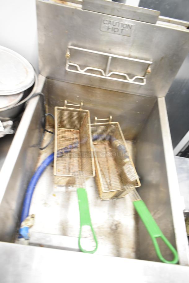 Frymaster GPCSC natural gas fryer, 80,000 BTU, floor style, two fryer baskets, caution hot label, commercial use.