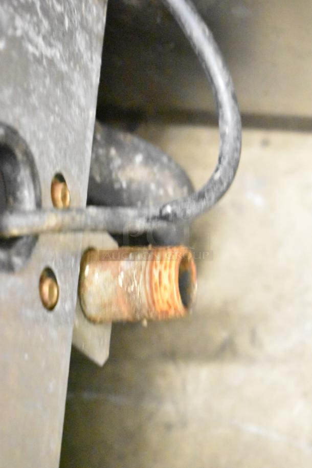 Frymaster GPCSC Natural Gas Fryer, 80,000 BTU, showing close-up of connections and wear, suitable for commercial use.