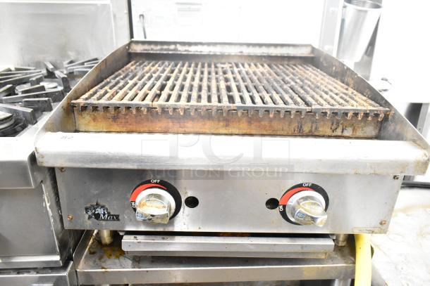 Star Max commercial countertop gas charbroiler grill, dual knobs, visible wear, ideal for restaurant use.