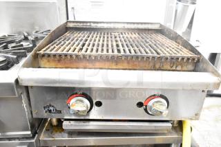 Star Max commercial countertop gas charbroiler grill, dual knobs, visible wear, ideal for restaurant use.