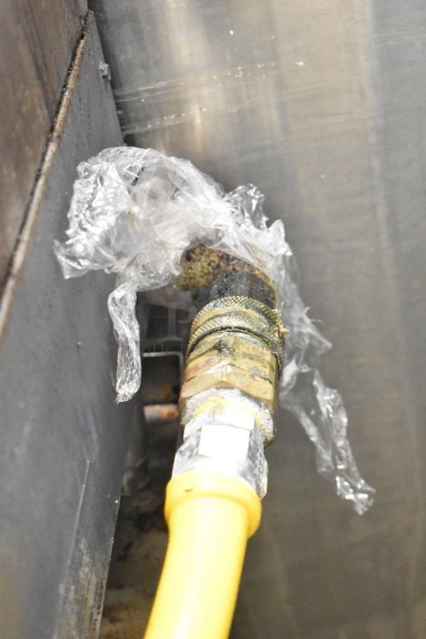 Star Max gas charbroiler grill connector, gas hose attached. Used condition, protective wrap on fitting.