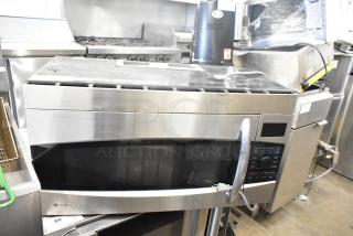 General Electric GE Profile PVM1790SR1SS microwave oven, stainless steel finish, digital keypad, includes plate.