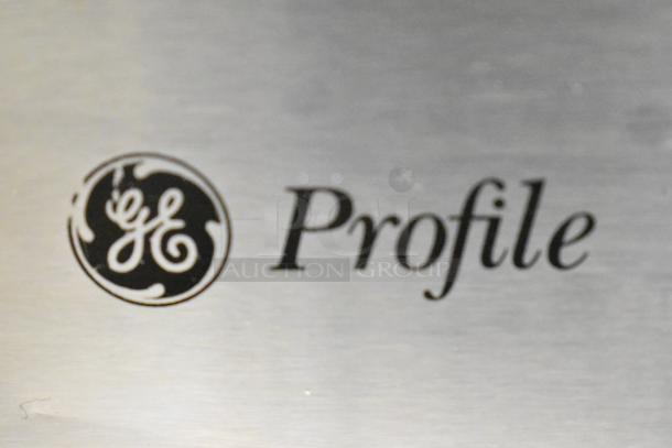 General Electric GE Profile PVM1790SR1SS logo on microwave oven, stainless steel finish.