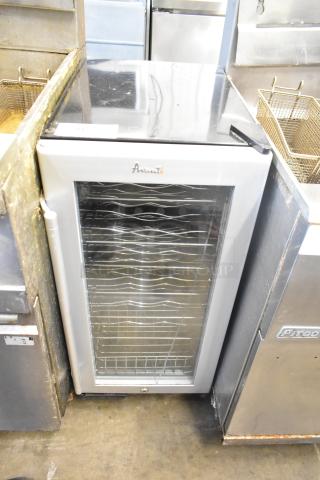 Avanti WC3200BG Mini Cooler Merchandiser, 115 Volts, 1 Phase, glass door, intact shelves, good condition.