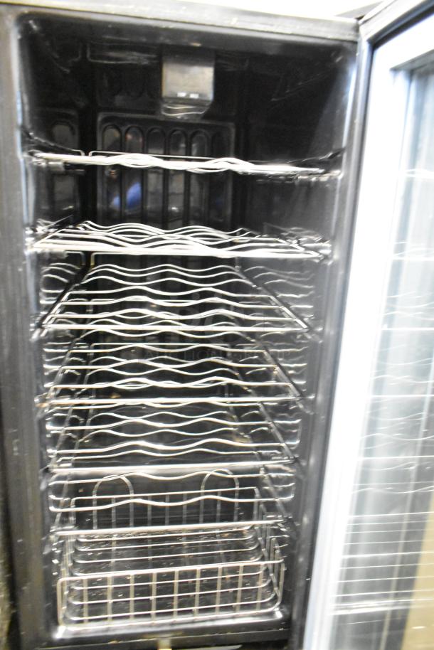 Avanti WC3200BG mini cooler merchandiser, 115 volts, 1 phase, with multiple shelves and open door, appears in good condition.