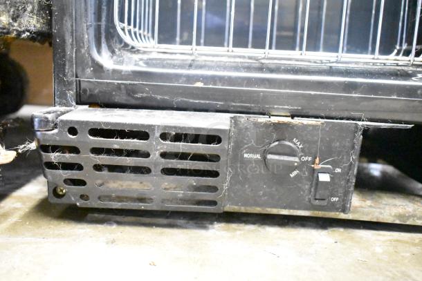 Avanti WC3200BG Mini Cooler Merchandiser, black exterior, control dial for temperature, some visible wear, 115V, 1 phase.