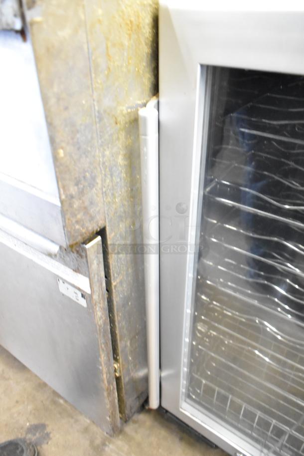 Avanti WC3200BG Mini Cooler Merchandiser, 115V, 1 Phase. Features glass door, metal frame. Condition shows wear.