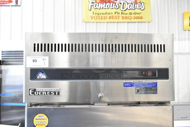 Everest ESF1 Commercial Single Door Reach In Freezer, 115 Volts, 1 Phase, labeled with refrigeration logo and warranty sticker.