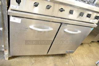 Ikon IUC48R Commercial 2 Door Undercounter Cooler, stainless steel, 115 volts, 1 phase, features dual handles and label.