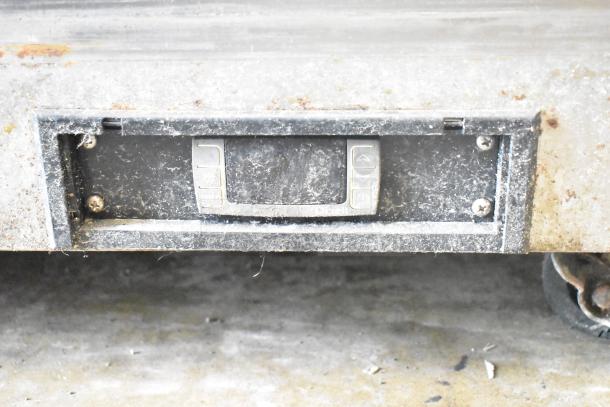 Ikon IUC48R commercial 2-door undercounter cooler, 115 volts, 1 phase, dusty control panel visible, fair condition.