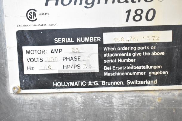 Hollymatic 180 Meat Mixer Grinder label showing serial number, motor details, and manufacturing info from Brunnen, Switzerland.