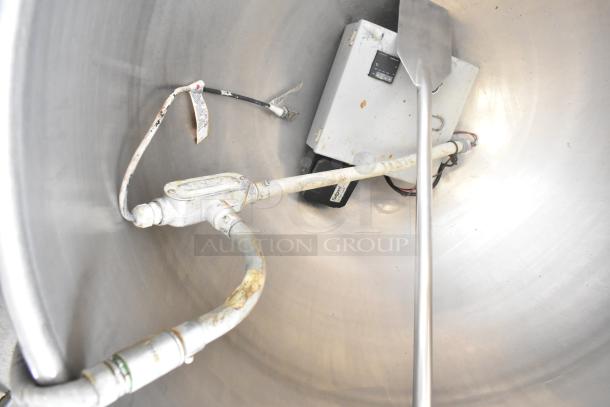 Cleveland KEL-100 electric kettle, 100-gallon, steam jacketed, stainless interior, visible wiring, uses 208/240 volts.